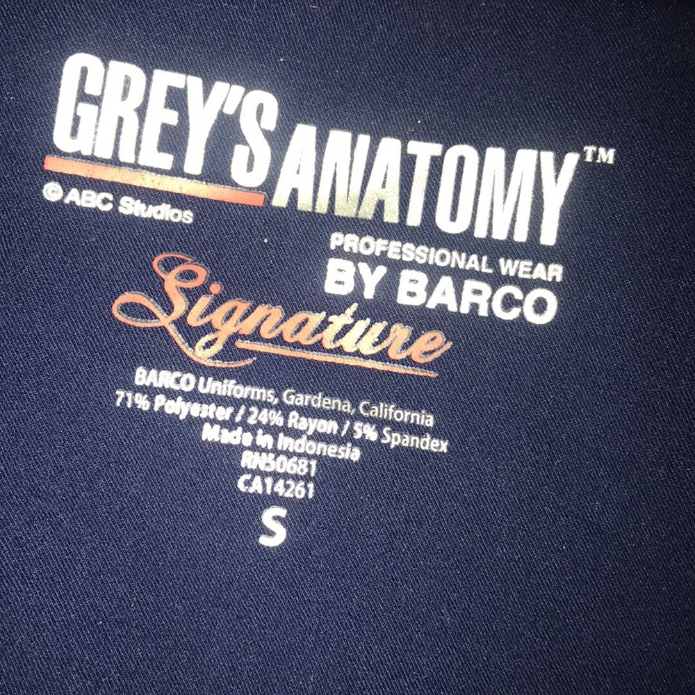 Lot of greys anatomy scrubs. Navy blue.